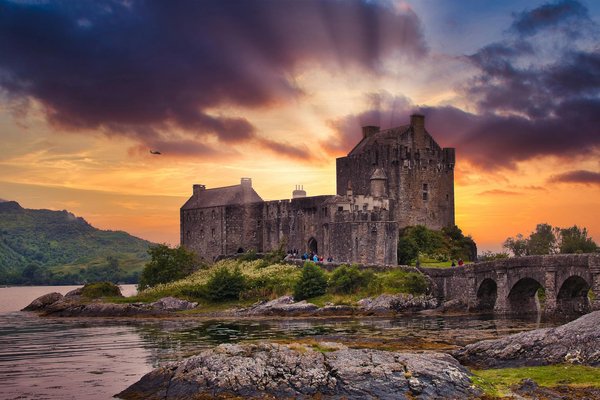 How can you book a guided historical walk of the UK's ancient fortresses?